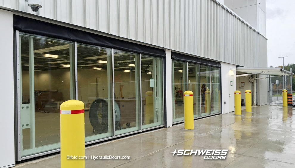 Schweiss Hydraulic doors are powered by a compact pump and held up with heavy-duty cylinders