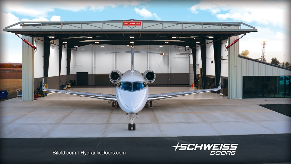 Schweiss Hangar Door is 23.6 ft tall due to the tail.