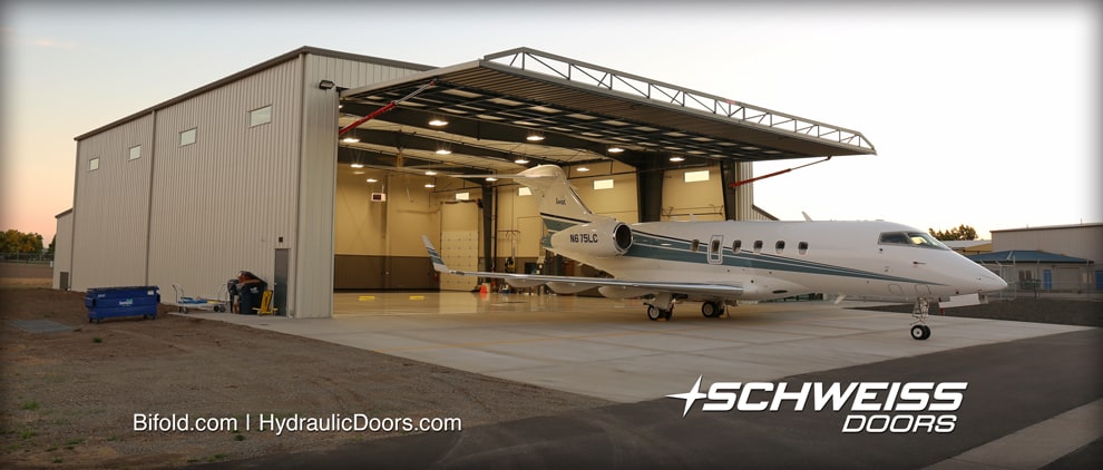 Schweiss One-Piece Hangar Door with Corporate Jet getting ready for take-off