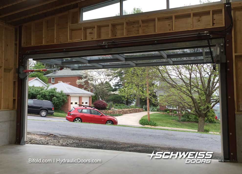 Schweiss Glass Doors give a beautiful view from within garage