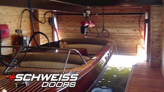 Red Power Hydraulic Door on Boathouse